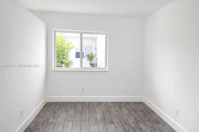 an empty room with a window