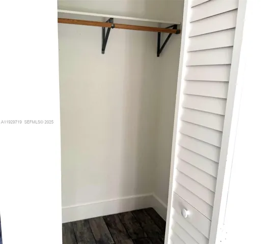 a view of a room with racks on the wall