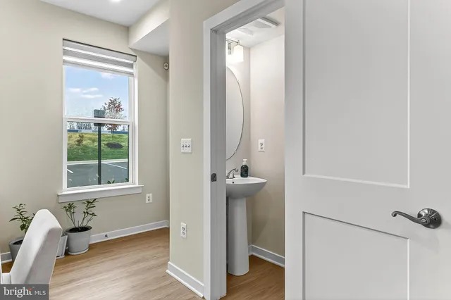 a view of a hallway view with staircase