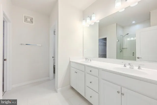 a view of empty room with stairs