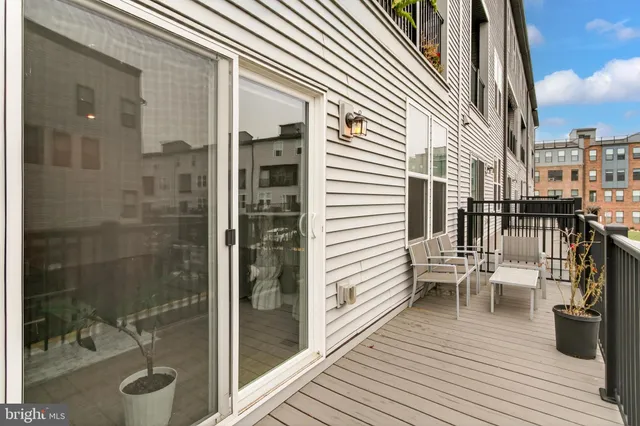 a view of a balcony with city view