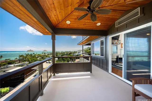 a view of balcony with furniture