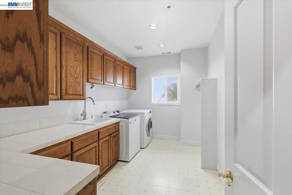 a living room with lots of furniture and a view of the lobby