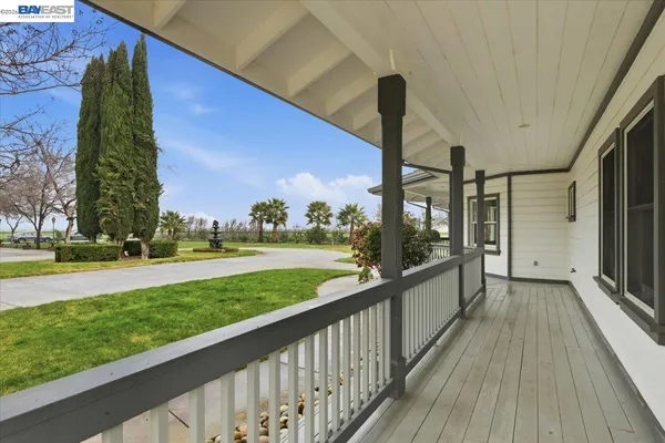 a view of a porch with a yard