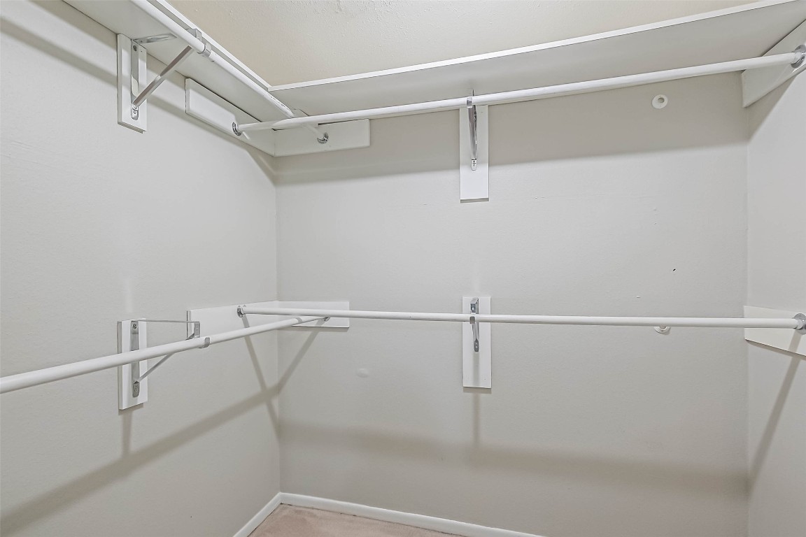7575 Katy Freeway, Unit 101 Houston, TX 77024 - Photo 11 of 21 a view of a room with racks on the wall