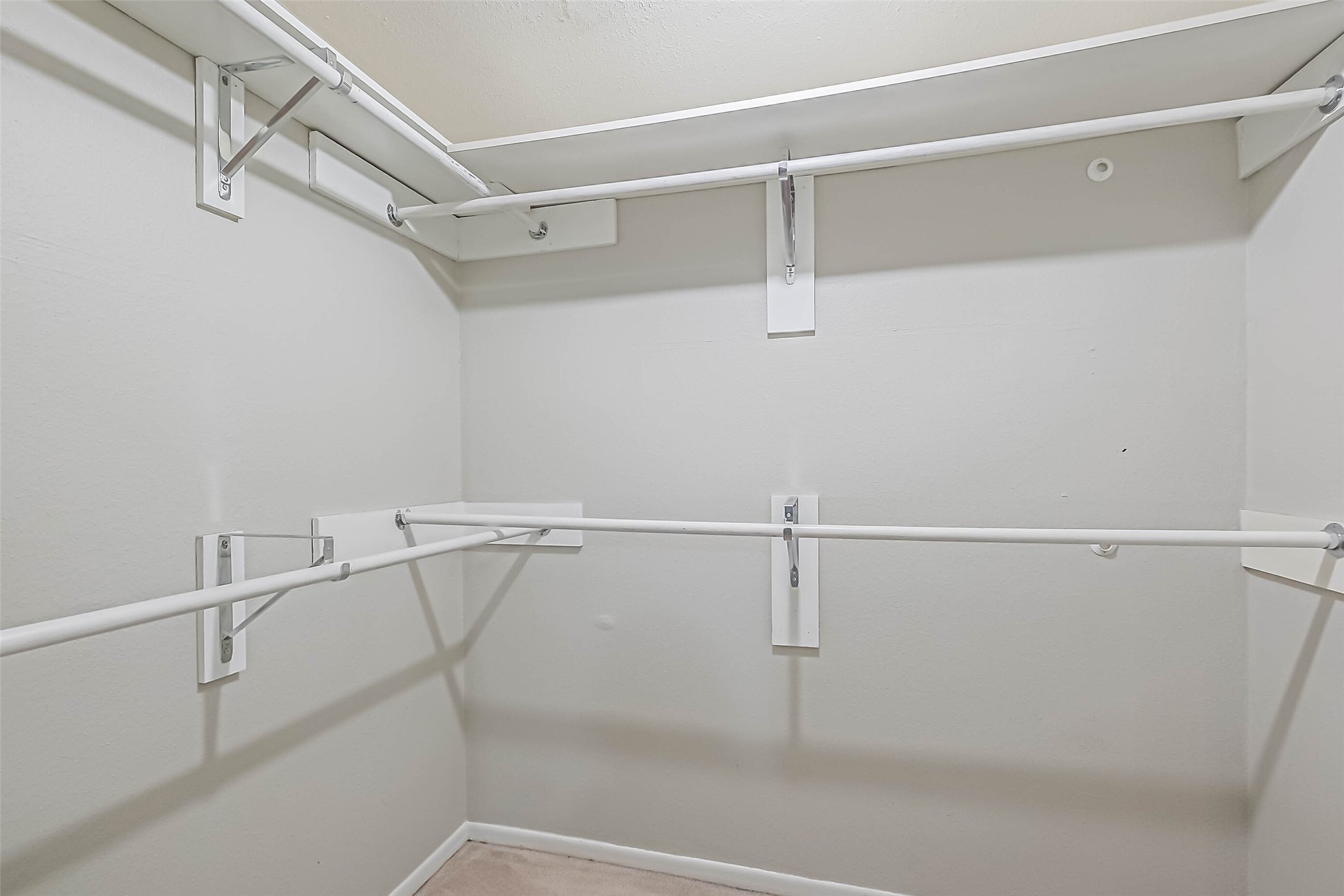 7575 Katy Freeway, Unit 101 Houston, TX 77024 - Photo 11 of 21 Primary closet. Lots of hanging space.