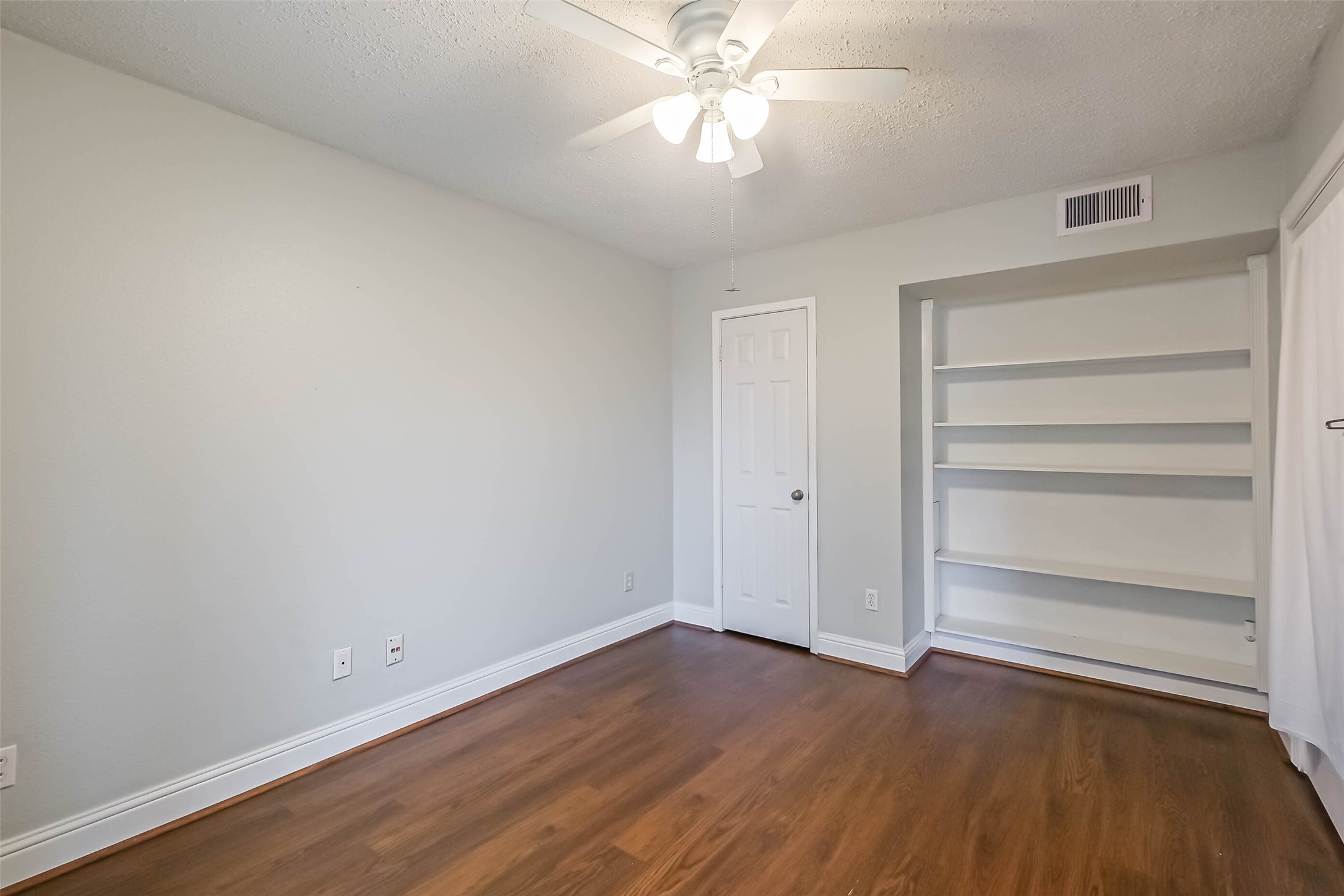 7575 Katy Freeway, Unit 101 Houston, TX 77024 - Photo 15 of 21 Useful built ins behind the door.