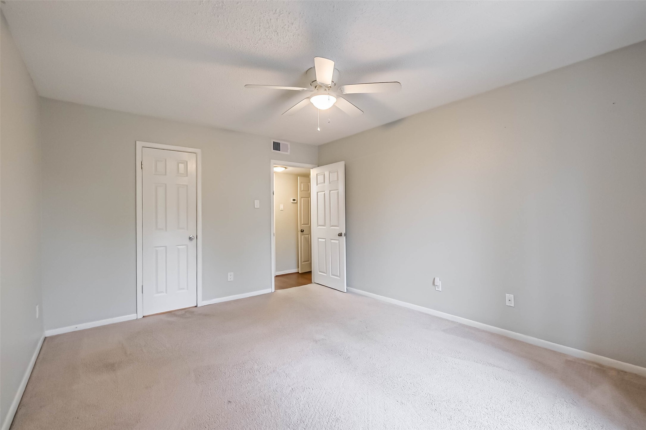 7575 Katy Freeway, Unit 101 Houston, TX 77024 - Photo 10 of 21 Generous sized room, with lots of natural light.