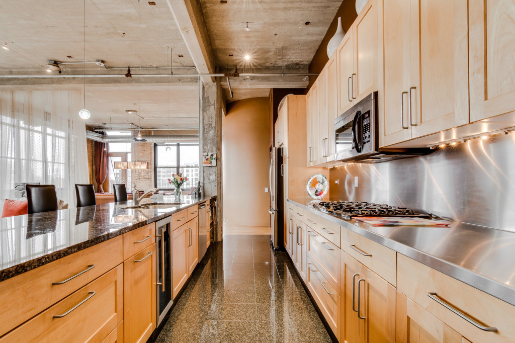 850 West Adams Street, Unit 6D Chicago, IL 60607 - Photo 14 of 35 a kitchen with stainless steel appliances granite countertop a stove and a white cabinets