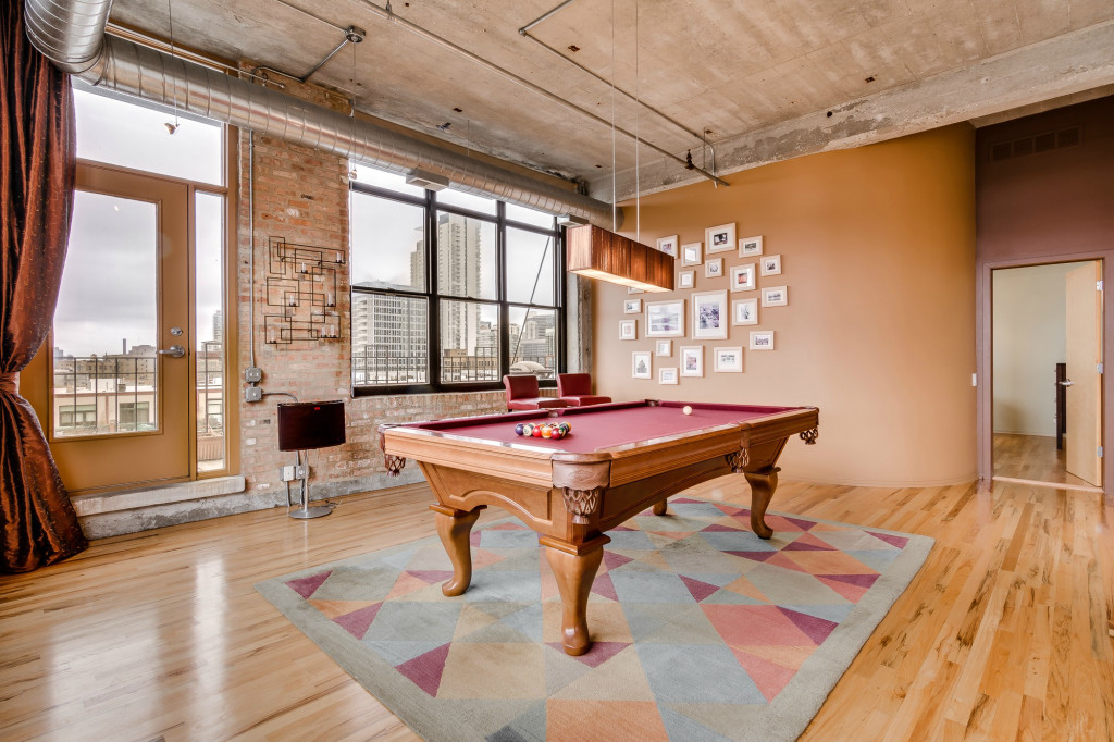 850 West Adams Street, Unit 6D Chicago, IL 60607 - Photo 17 of 35 a living room with a table chairs and a table