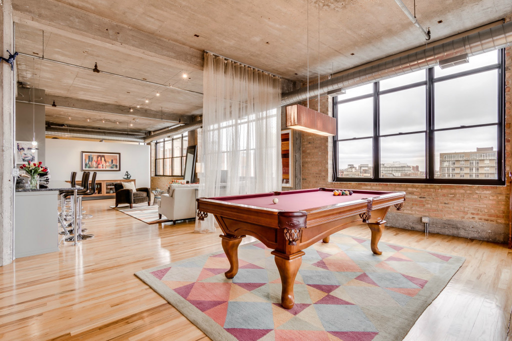 850 West Adams Street, Unit 6D Chicago, IL 60607 - Photo 19 of 35 a living room with a table chairs and wooden floor