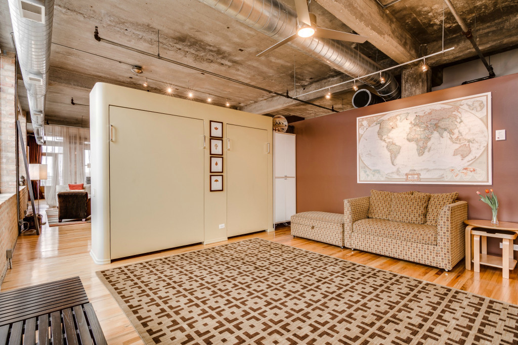 850 West Adams Street, Unit 6D Chicago, IL 60607 - Photo 30 of 35 a bedroom with furniture and a rug