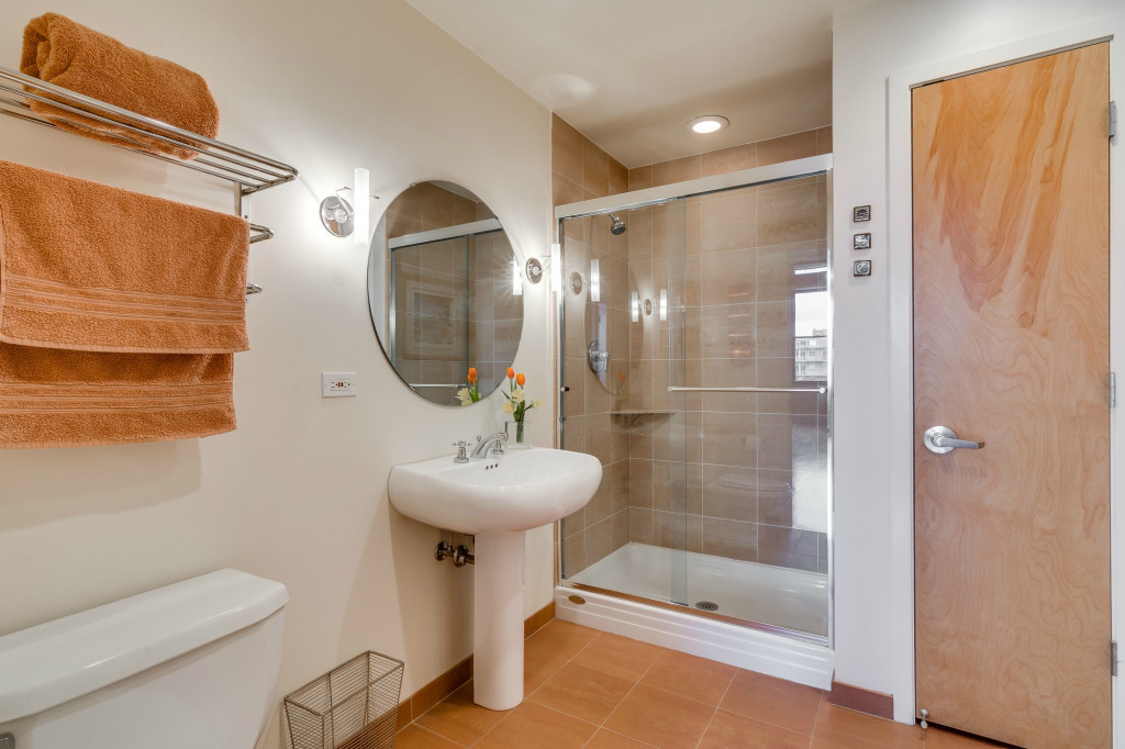 850 West Adams Street, Unit 6D Chicago, IL 60607 - Photo 31 of 35 a bathroom with a sink toilet and shower