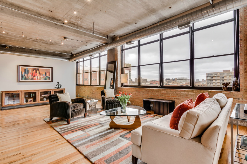 850 West Adams Street, Unit 6D Chicago, IL 60607 - Photo 6 of 35 a living room with furniture fireplace and a large window