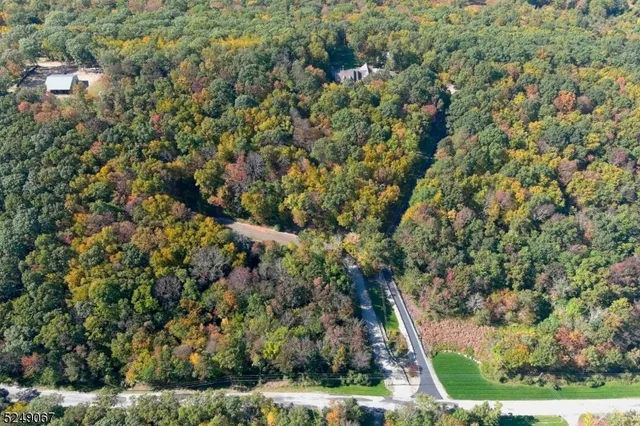 a balcony with wooden floor and fence