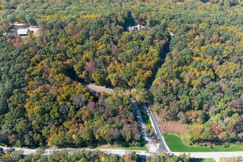 93 Moore Road Wantage, NJ 07461 - Photo 14 of 25 an aerial view of residential houses with outdoor space and trees