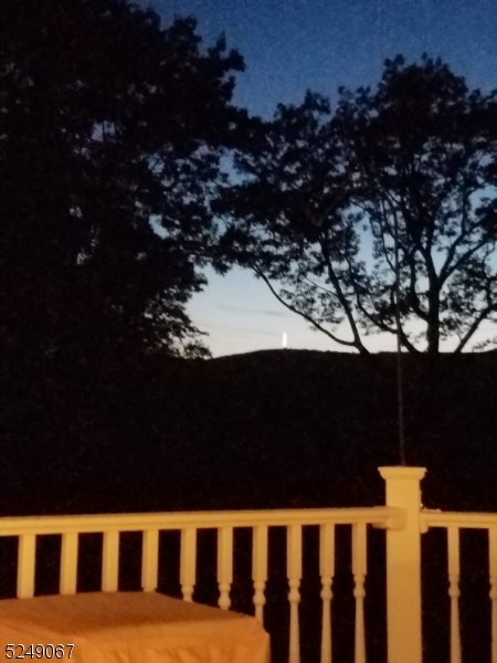 93 Moore Road Wantage, NJ 07461 - Photo 16 of 25 a balcony with wooden floor and fence