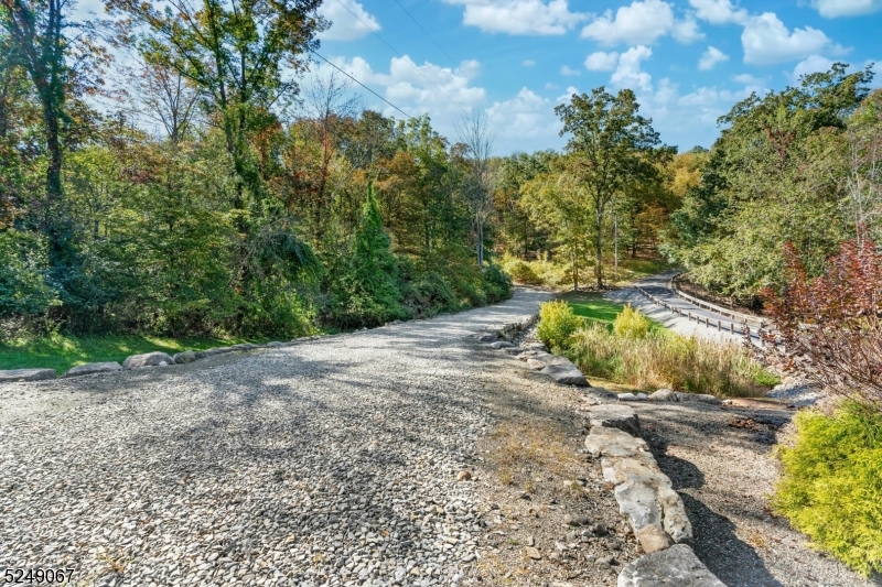93 Moore Road Wantage, NJ 07461 - Photo 3 of 25 a view of a pathway with a yard