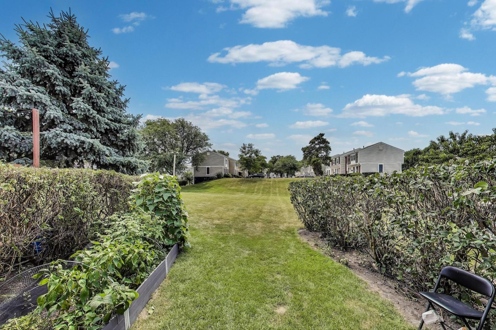 2067 Kettering Road Hoffman Estates, IL 60169 - Photo 25 of 28 a view of a garden