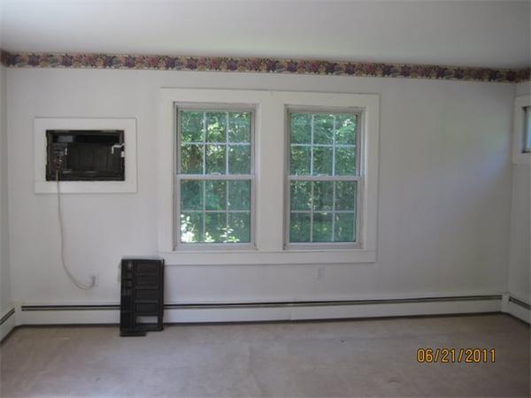 82 Teele Road Bolton, MA 01740 - Photo 8 of 12 a view of a livingroom with a furniture