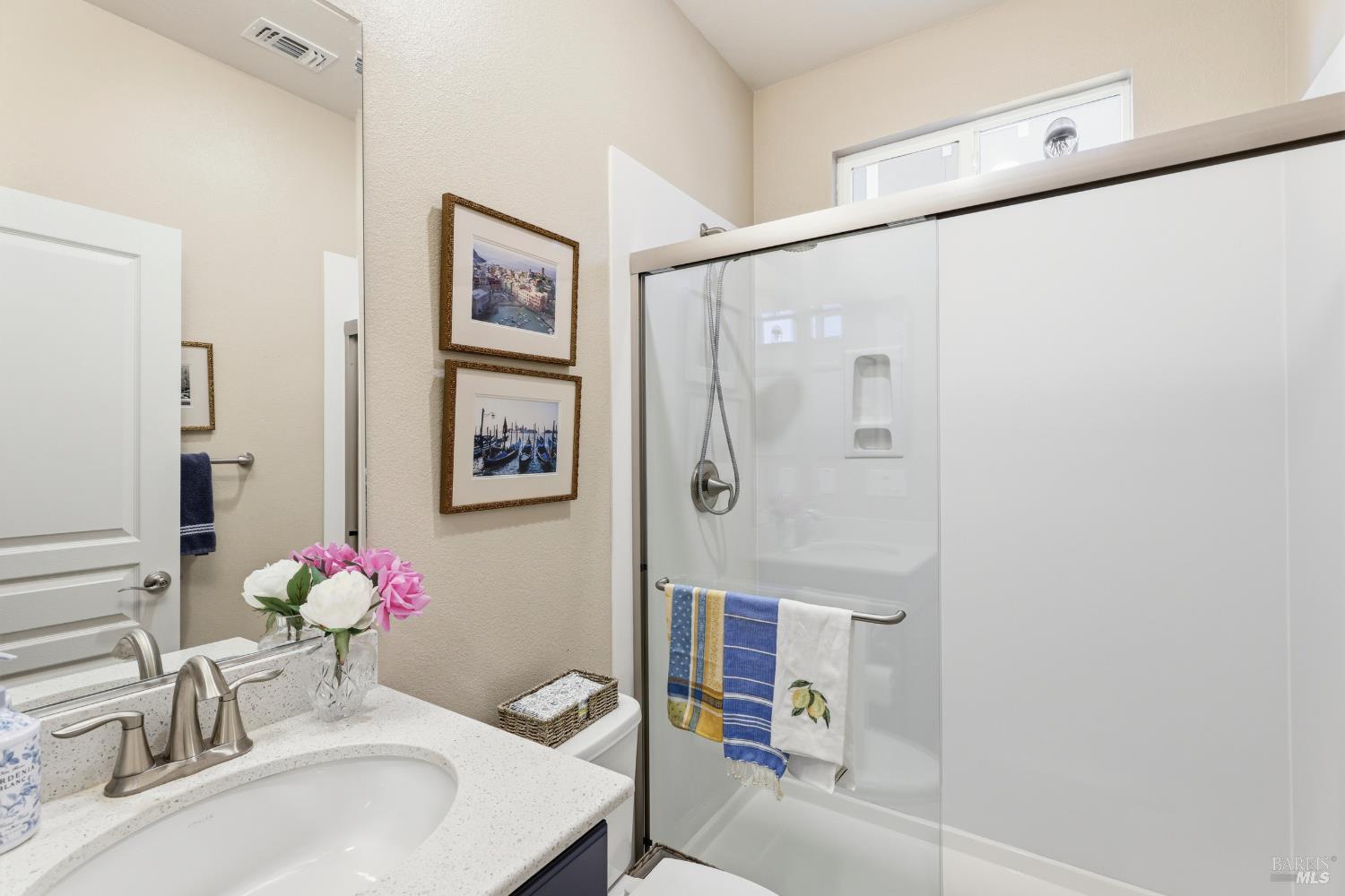 5533 Kennedy Place Rohnert Park, CA 94928 - Photo 12 of 63 a bathroom with a sink mirror and a bath tub