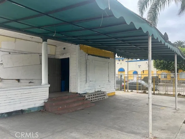 a view of a porch with hardwood