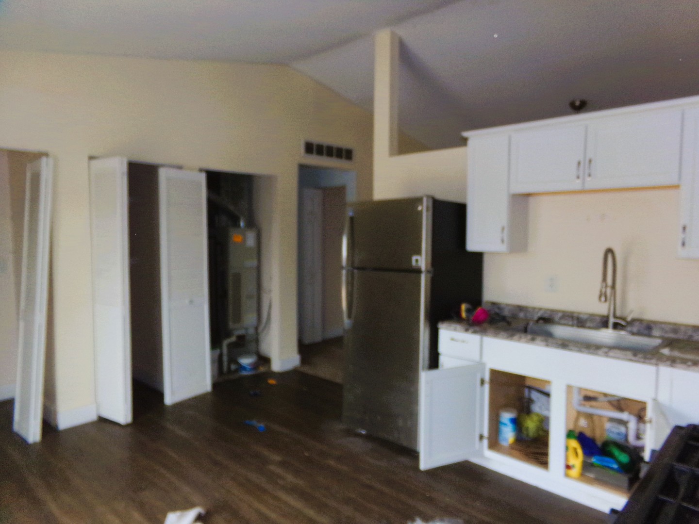 2125 44th Street Moline, IL 61265 - Photo 4 of 12 a kitchen with stainless steel appliances granite countertop a refrigerator and a sink