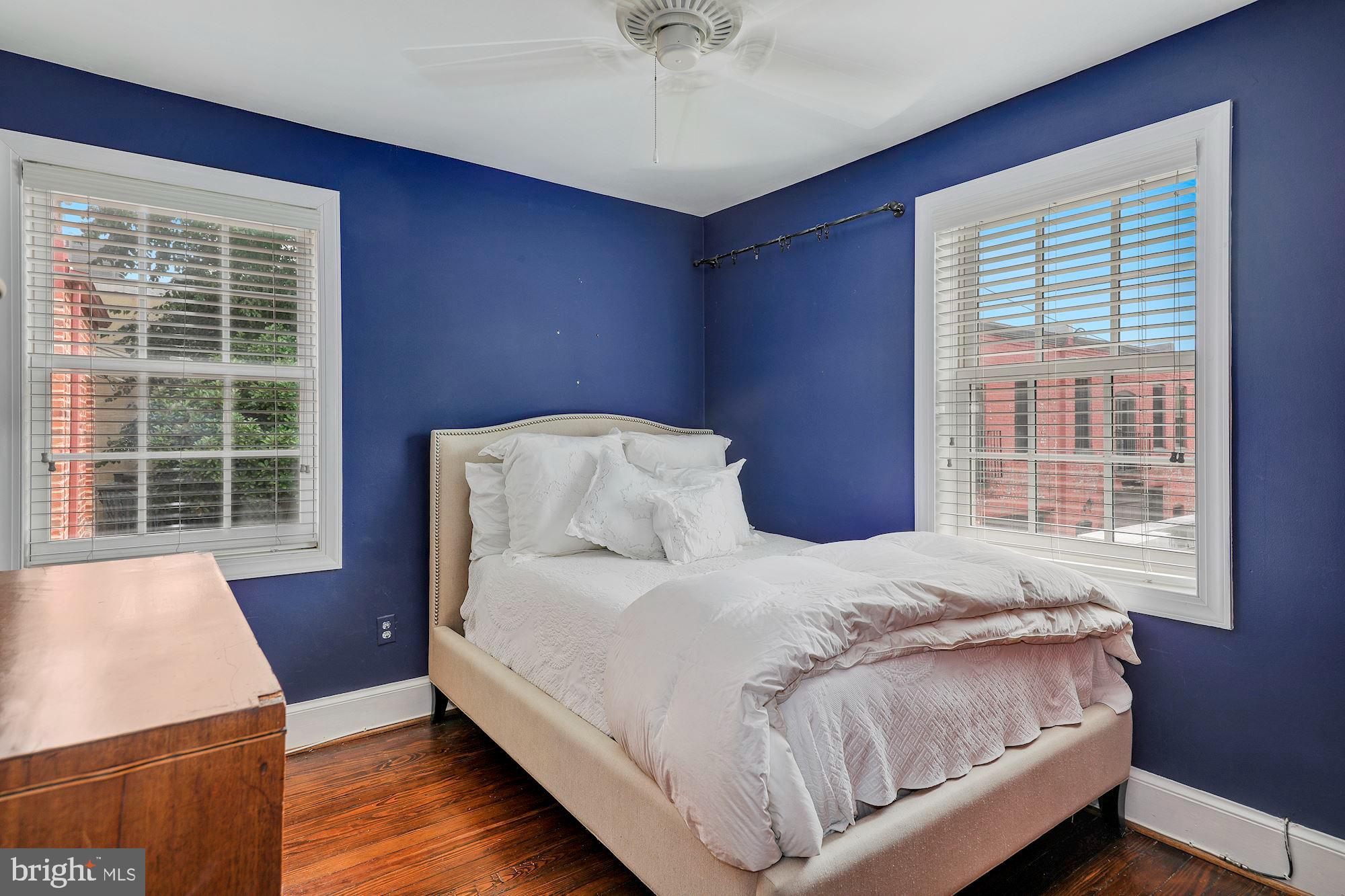 315 Constitution Avenue Northeast Washington, DC 20002 - Photo 26 of 32 a bedroom with a bed and a window