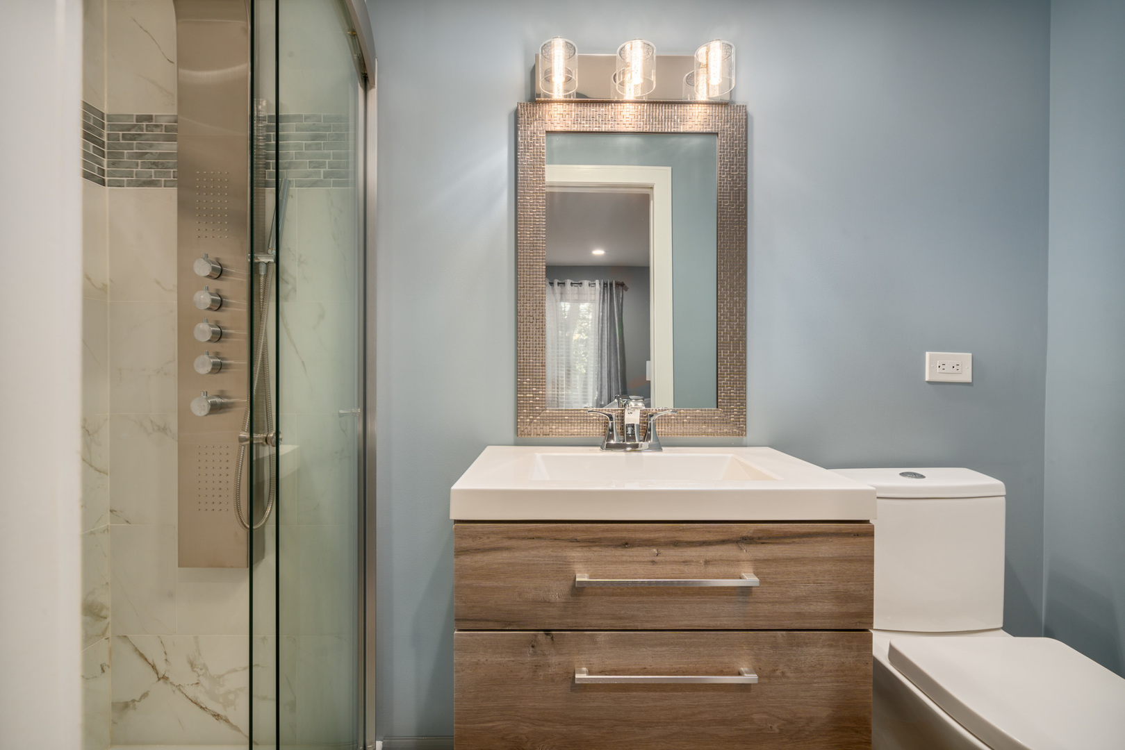 12 Cour Monnet Palos Hills, IL 60465 - Photo 11 of 27 a bathroom with a sink and a mirror