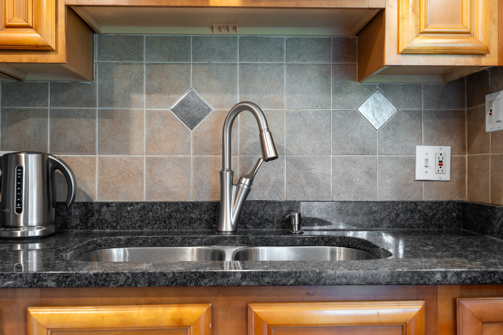 12 Cour Monnet Palos Hills, IL 60465 - Photo 16 of 27 a kitchen with a sink a faucet and window