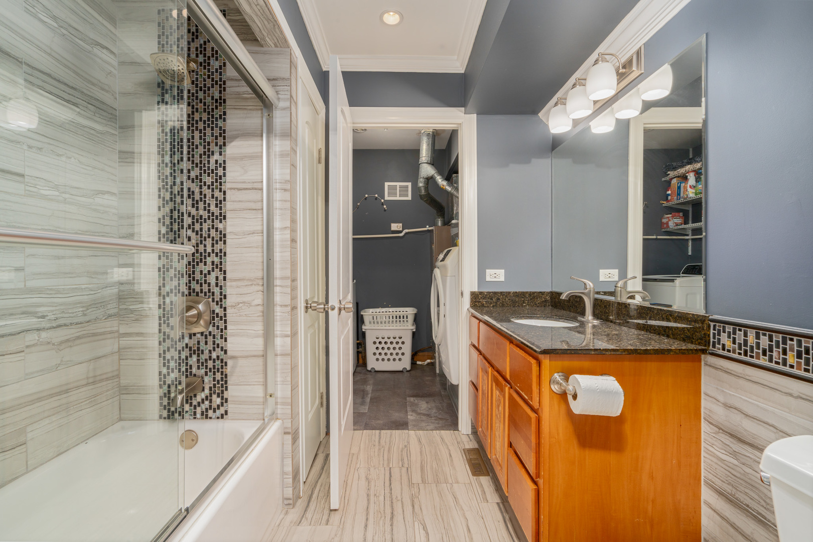 12 Cour Monnet Palos Hills, IL 60465 - Photo 17 of 27 a bathroom with a granite countertop sink a toilet and shower