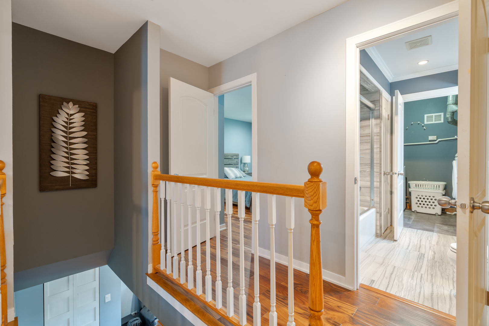 12 Cour Monnet Palos Hills, IL 60465 - Photo 21 of 27 a view of hallway with wooden floor and a bedroom