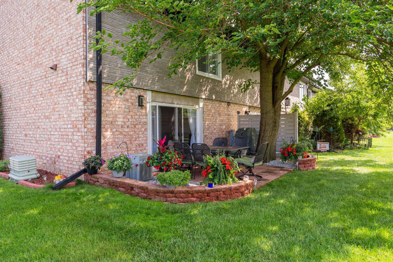 12 Cour Monnet Palos Hills, IL 60465 - Photo 8 of 27 a view of a house with a backyard and a tree