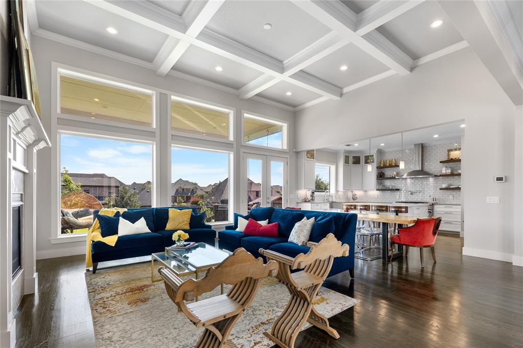 a very nice looking living room with furniture and a large window
