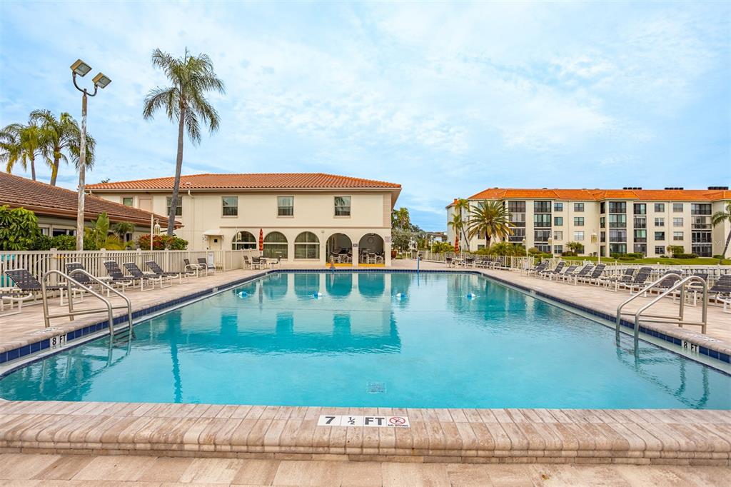 19029 US Highway 19 North, Unit 10C Clearwater, FL 33764 - Photo 53 of 61 a view of swimming pool with a balcony