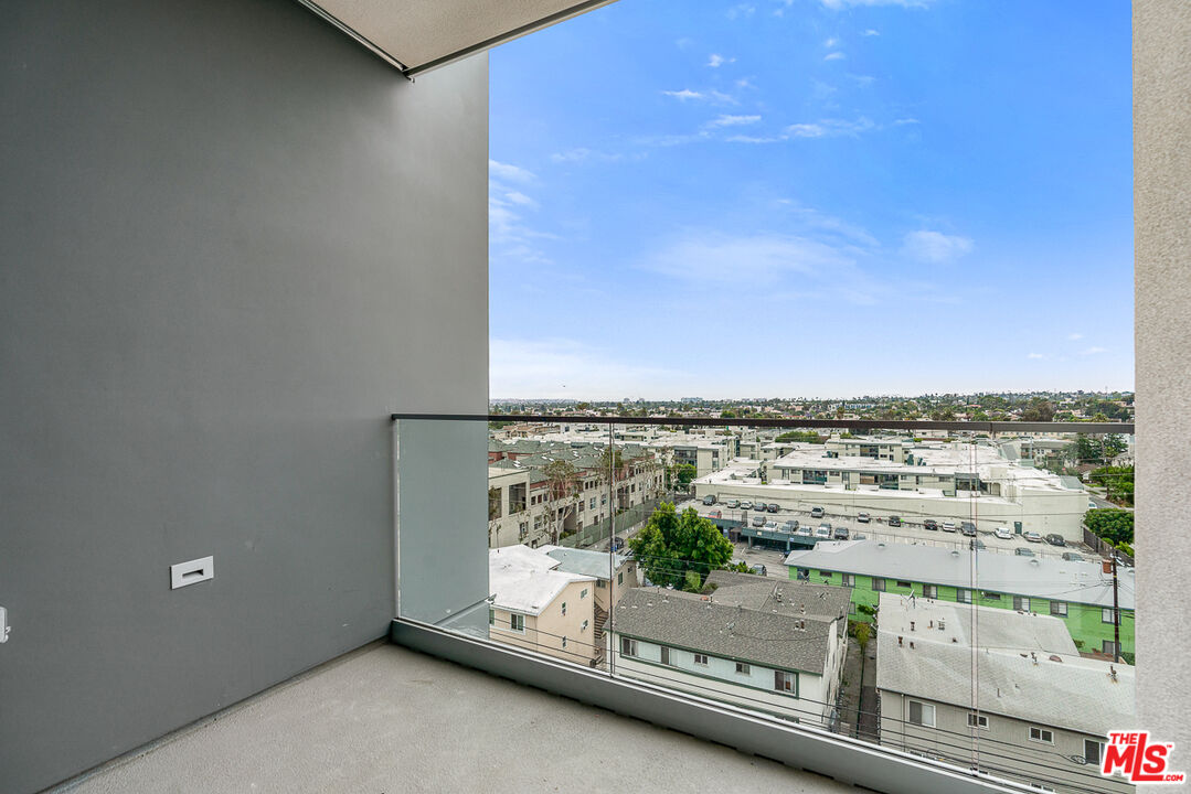 3688 Overland Avenue, Unit 312 Los Angeles, CA 90034 - Photo 14 of 33 a view of a balcony with an outdoor space