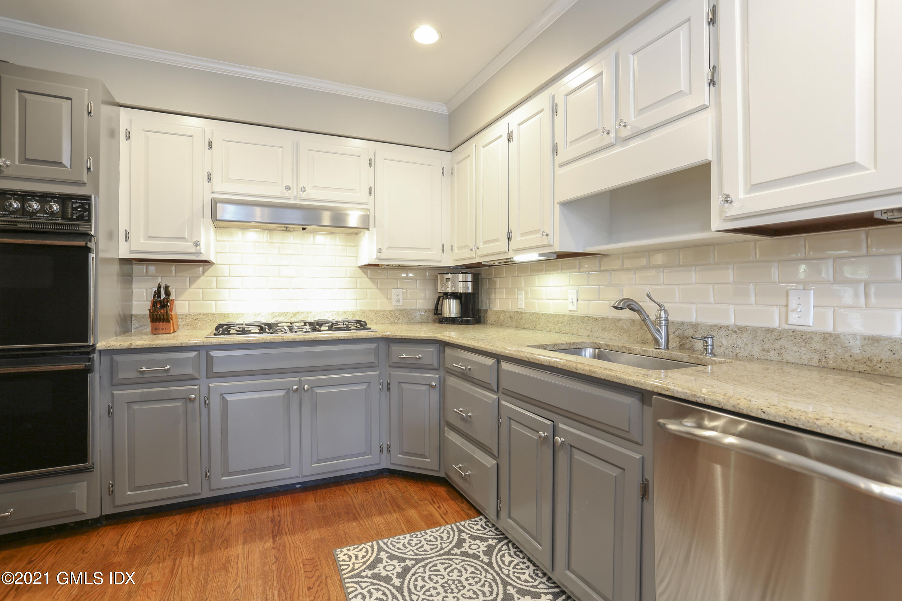 236 Palmer Hill Road Old Greenwich, CT 06870 - Photo 11 of 33 a kitchen with stainless steel appliances granite countertop a sink stove and cabinets