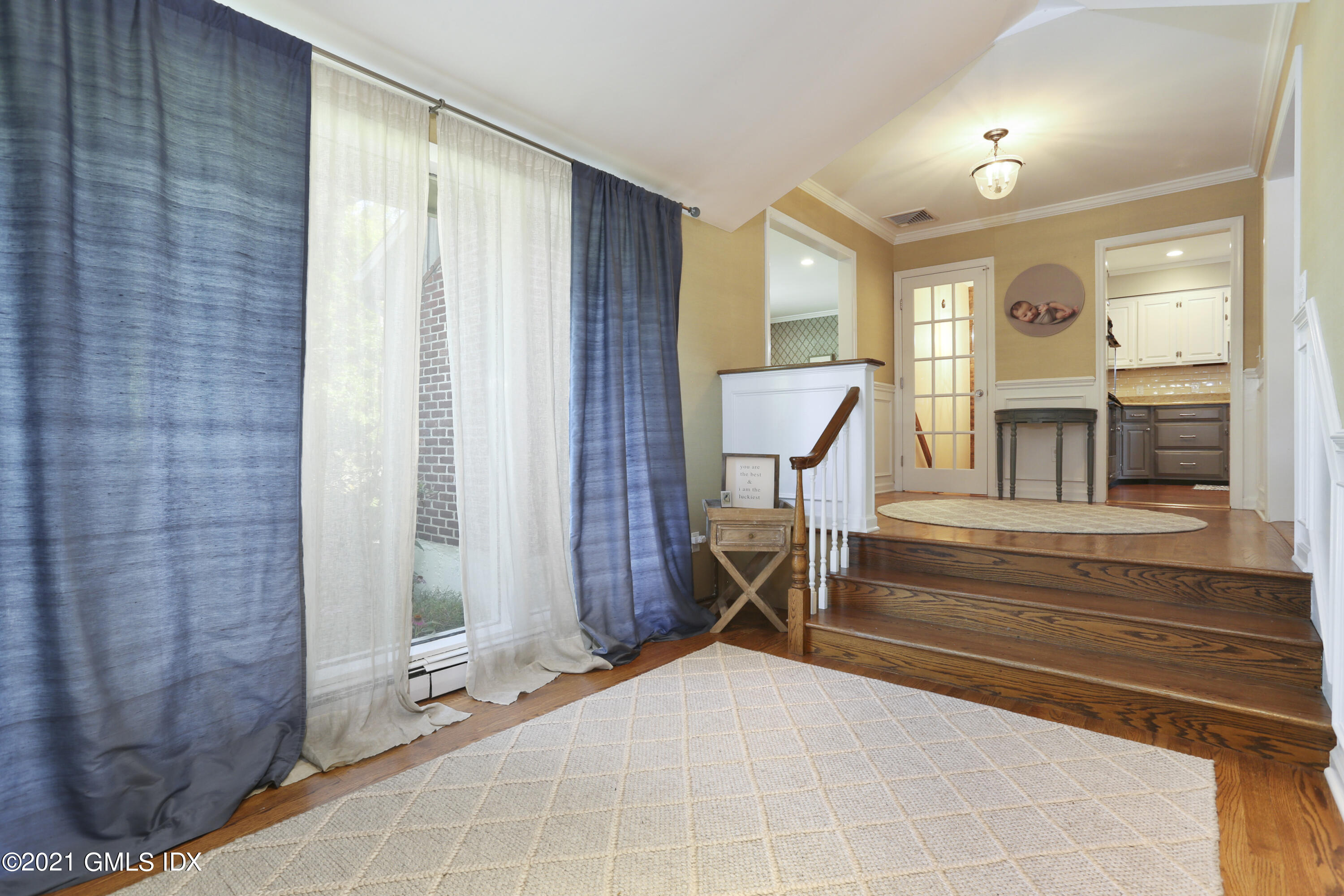 236 Palmer Hill Road Old Greenwich, CT 06870 - Photo 19 of 33 a view of a livingroom with furniture and staircase