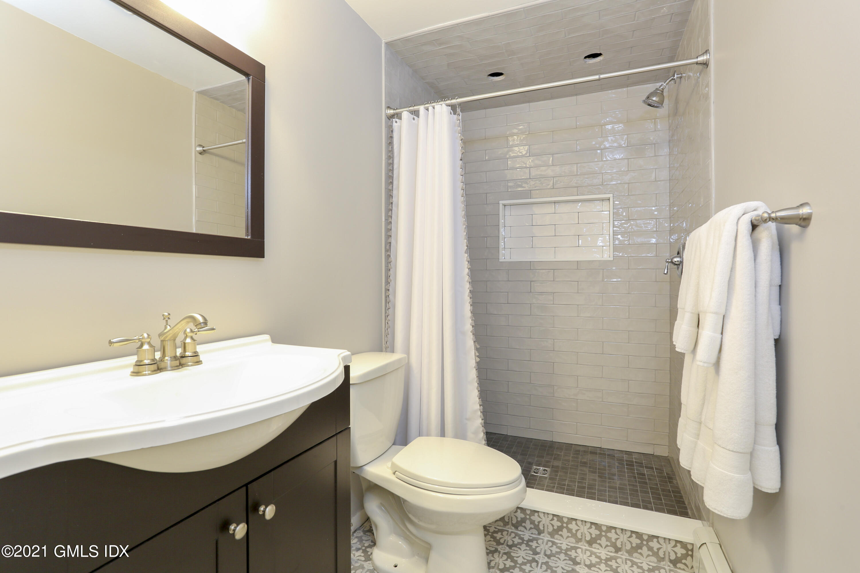 236 Palmer Hill Road Old Greenwich, CT 06870 - Photo 20 of 33 a bathroom with a sink toilet and shower