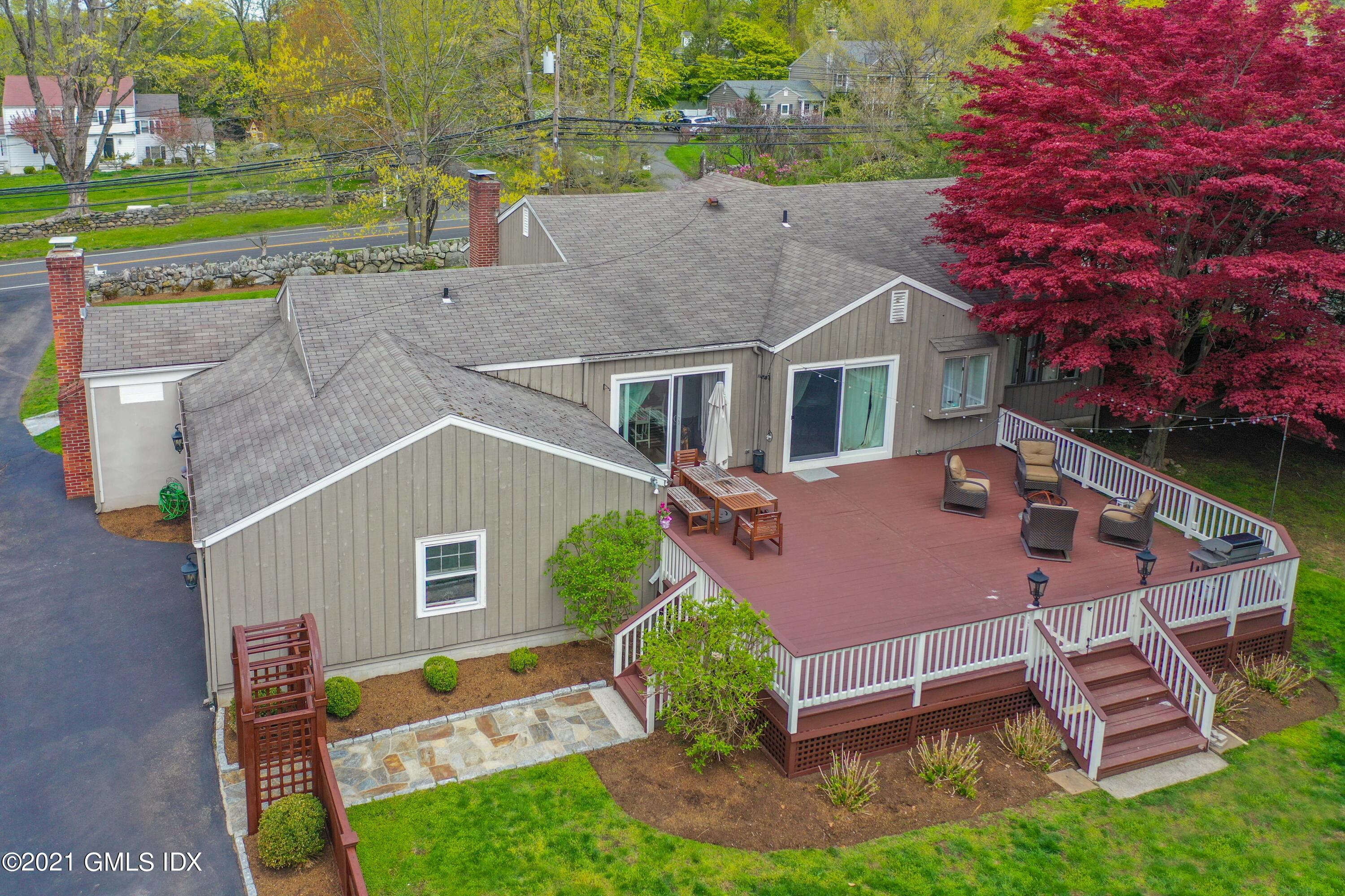236 Palmer Hill Road Old Greenwich, CT 06870 - Photo 24 of 33 an aerial view of a house with swimming pool and a yard