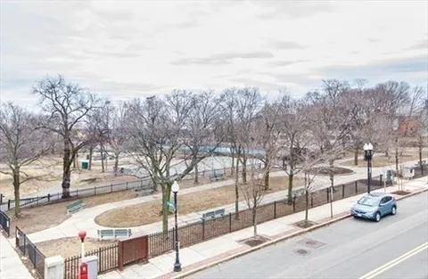 a view of a city with tall buildings