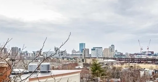 a view of a balcony with wooden floor