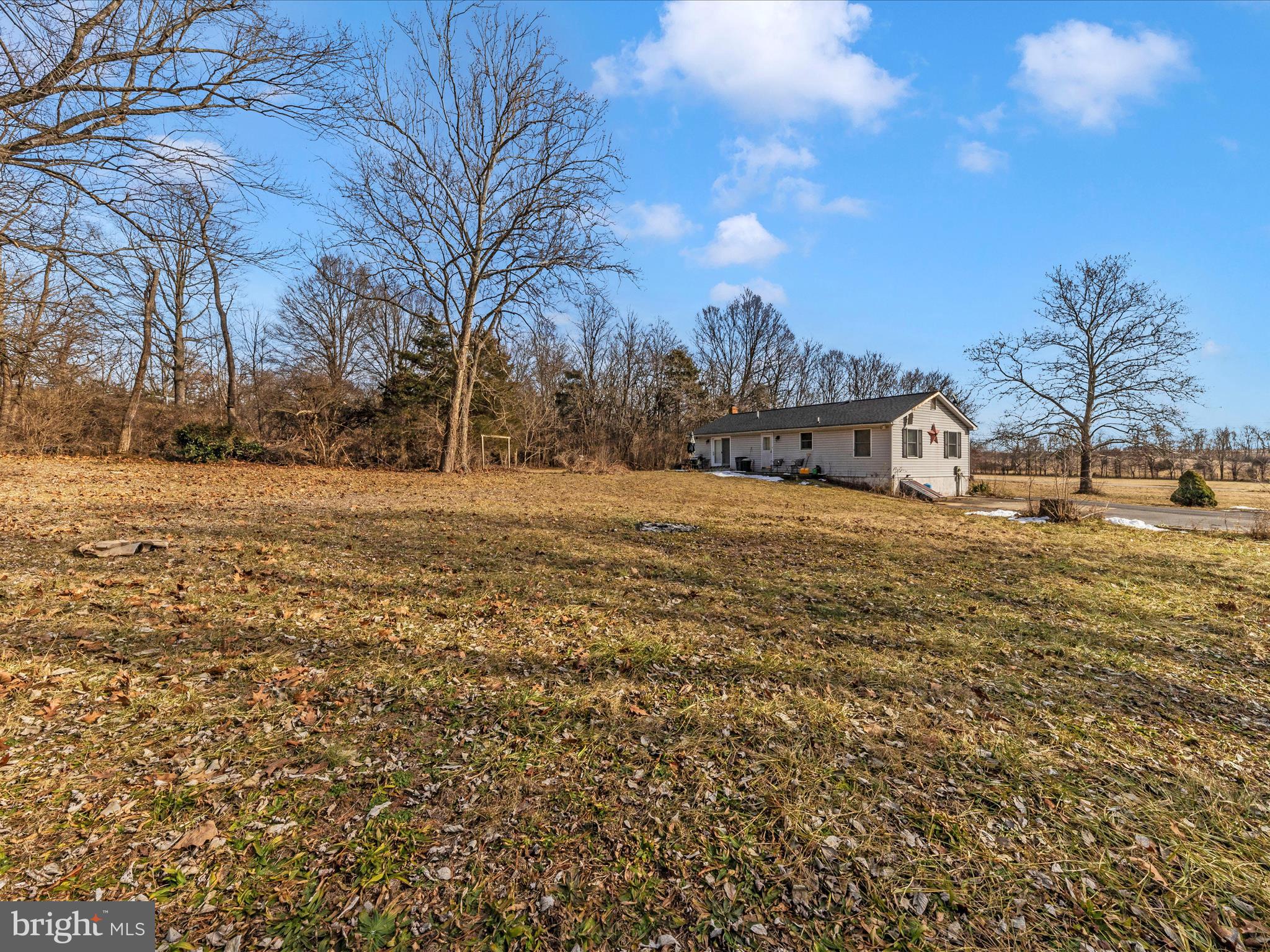 12258 St Paul Road Clear Spring, MD 21722 - Photo 13 of 15 a view of a field with large trees