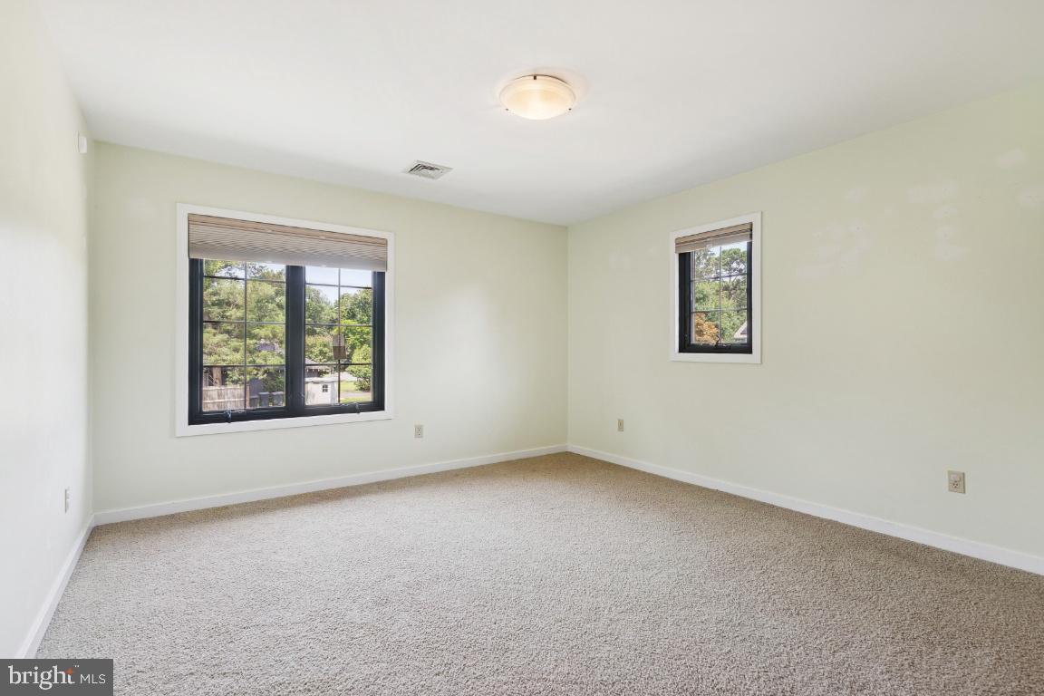 506 Lazy Lane Absecon, NJ 08201 - Photo 18 of 26 an empty room with a window