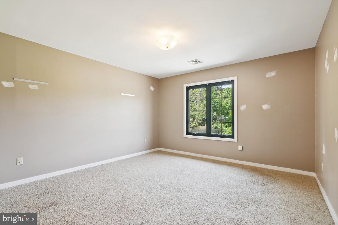 506 Lazy Lane Absecon, NJ 08201 - Photo 19 of 26 an empty room with windows