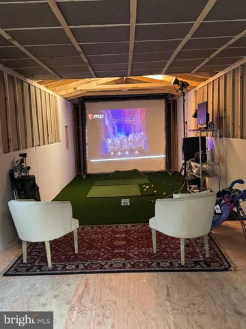 a living room with a couch and a table