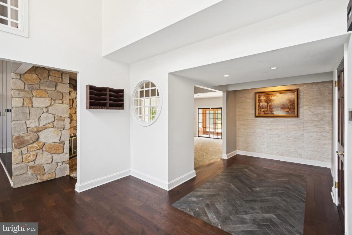 506 Lazy Lane Absecon, NJ 08201 - Photo 3 of 26 an empty room with windows and cabinet