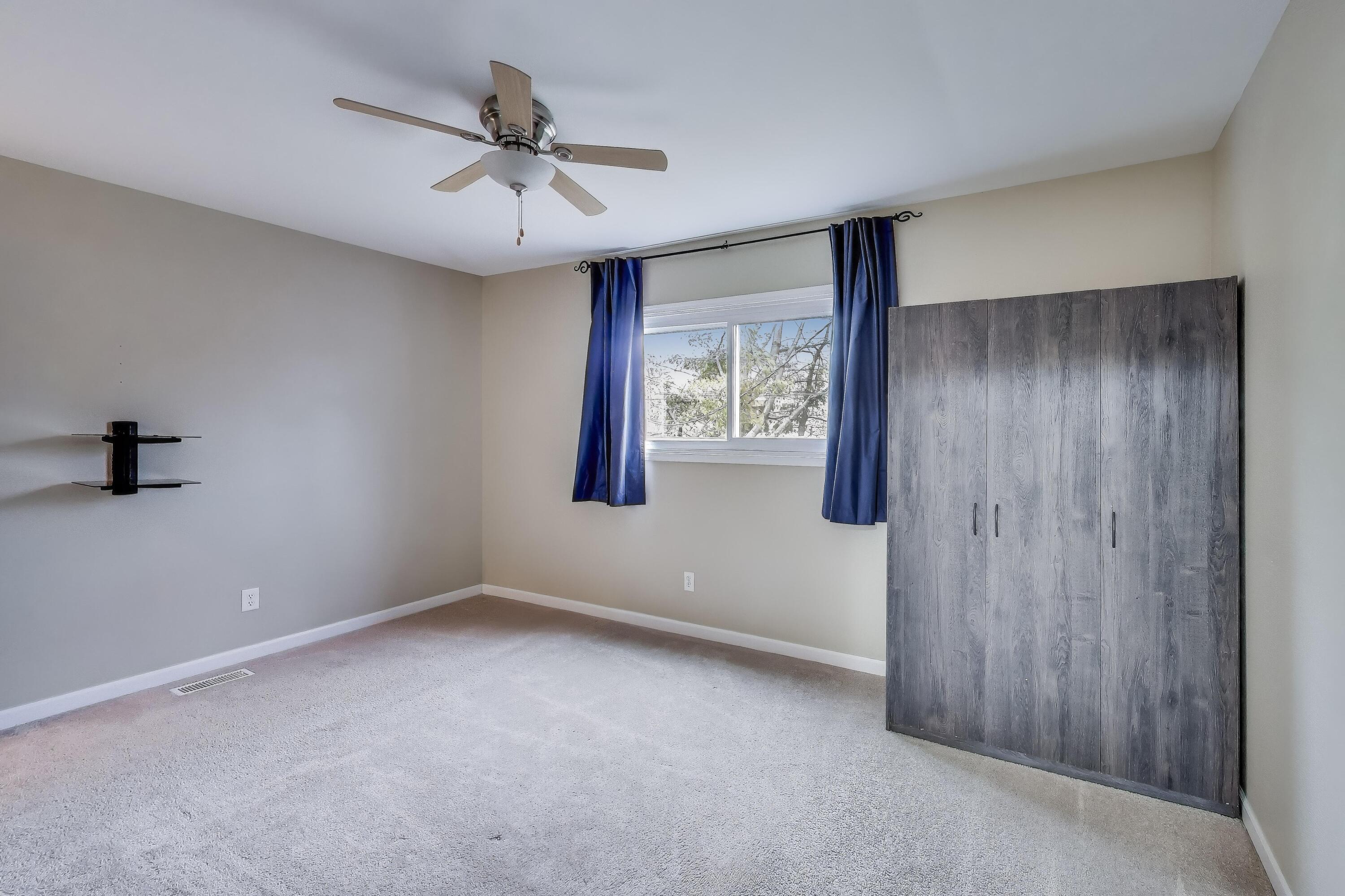 816 East 39th Lane Griffith, IN 46319 - Photo 14 of 42 a view of an empty room with a window