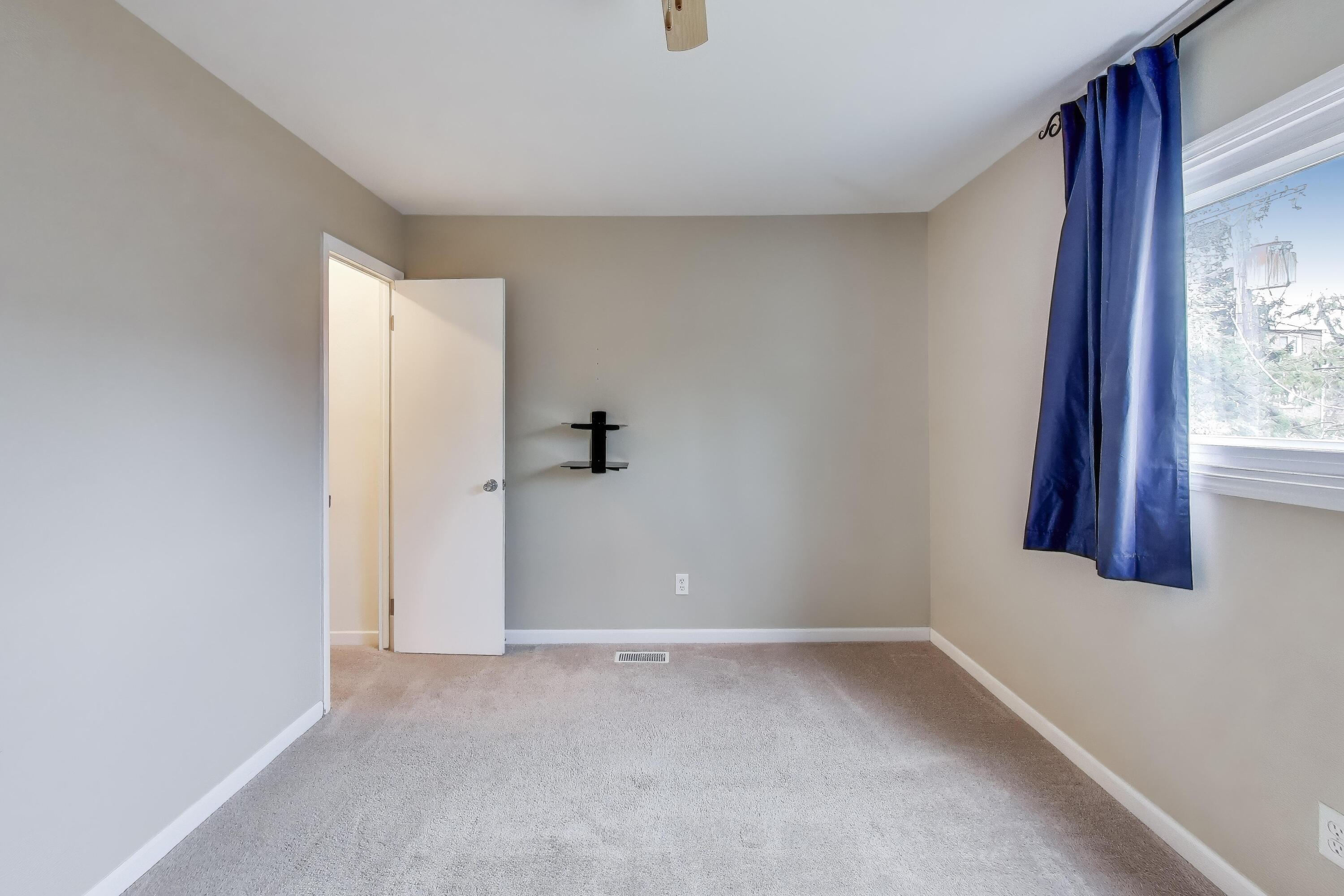 816 East 39th Lane Griffith, IN 46319 - Photo 15 of 42 a view of an empty room with a window