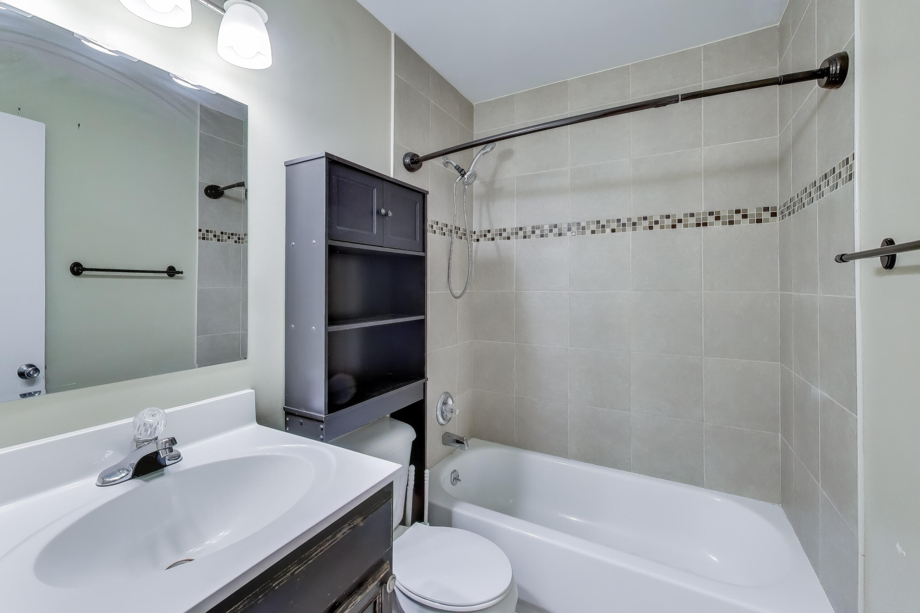816 East 39th Lane Griffith, IN 46319 - Photo 22 of 42 a bathroom with a sink toilet and shower